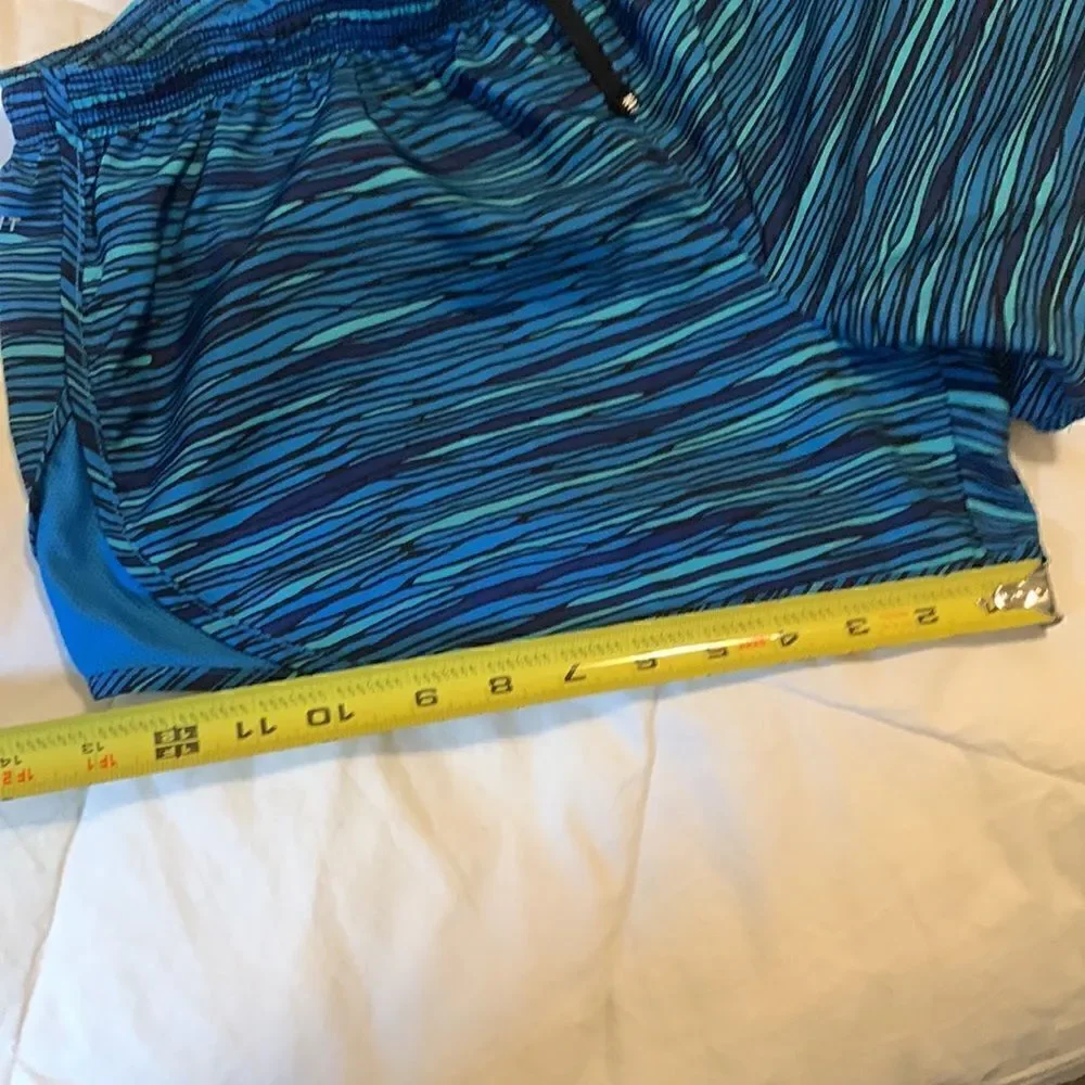 NIKE, running shorts, built in liner, draw cord and vent side, great condition - Picture 8 of 10